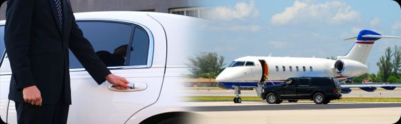 A white limo and an airplane on the tarmac.