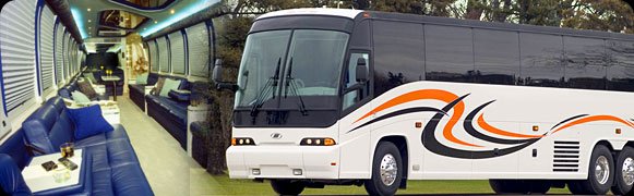 A white bus is parked in the grass.